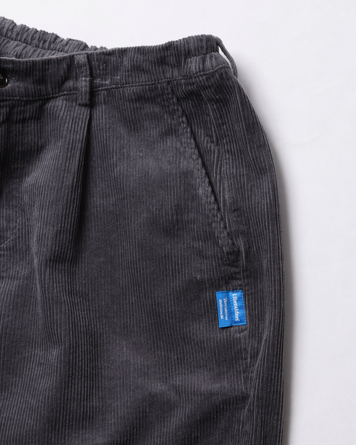 CORDUROY TAPERED SLACKS