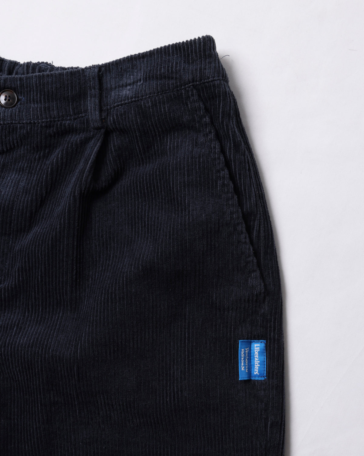 CORDUROY TAPERED SLACKS
