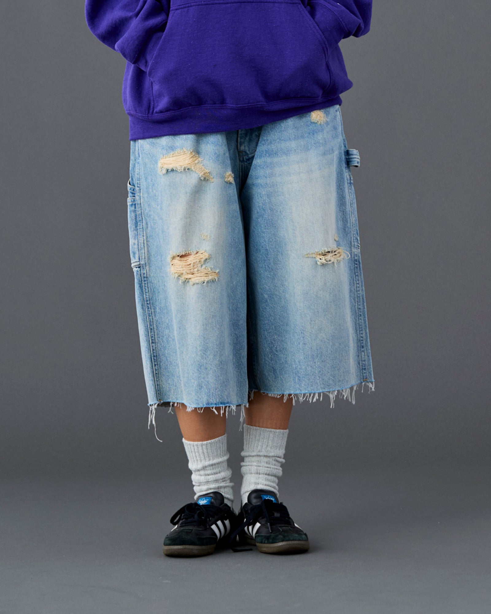 DAMAGED DENIM BUGGY SHORTS