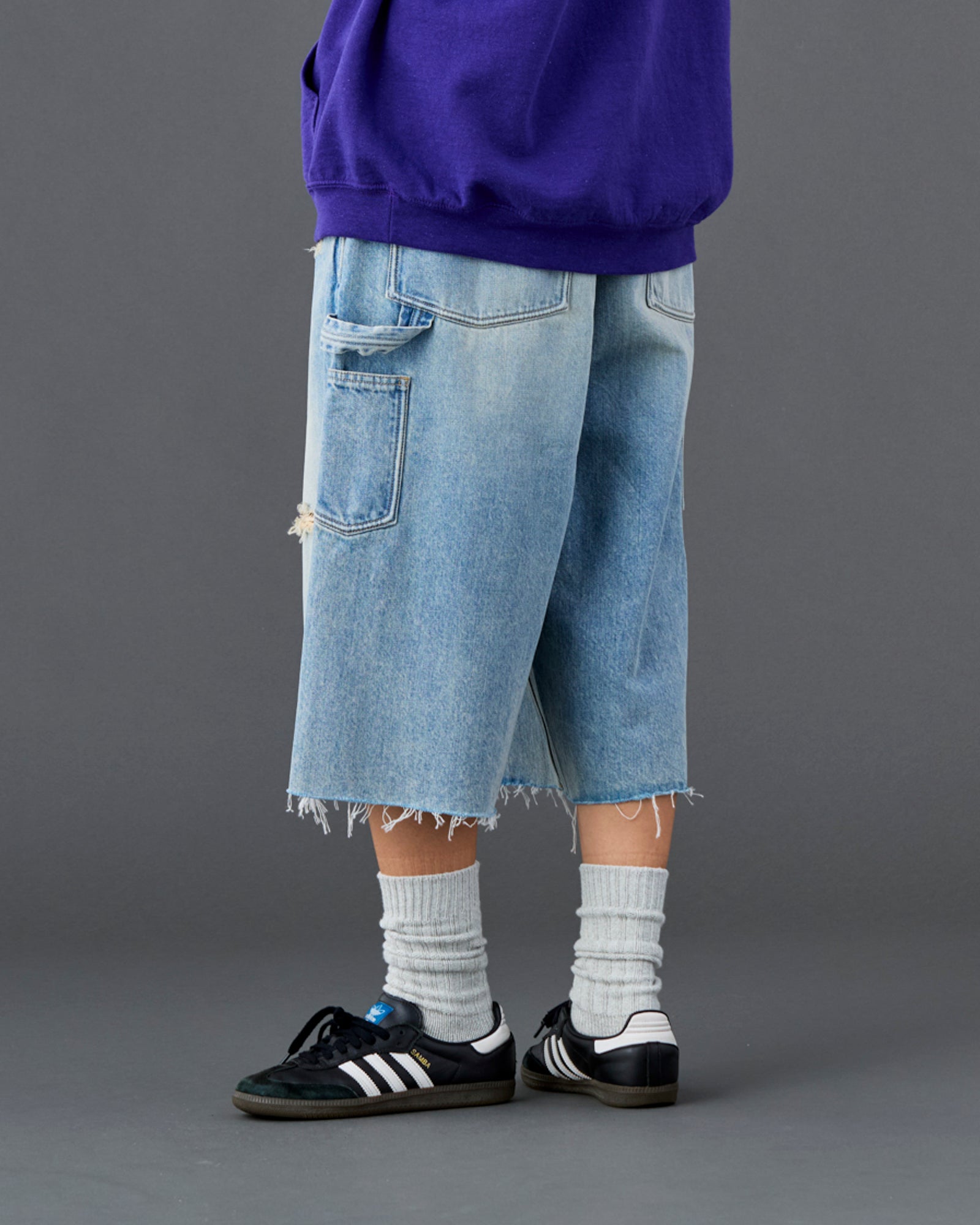 DAMAGED DENIM BUGGY SHORTS