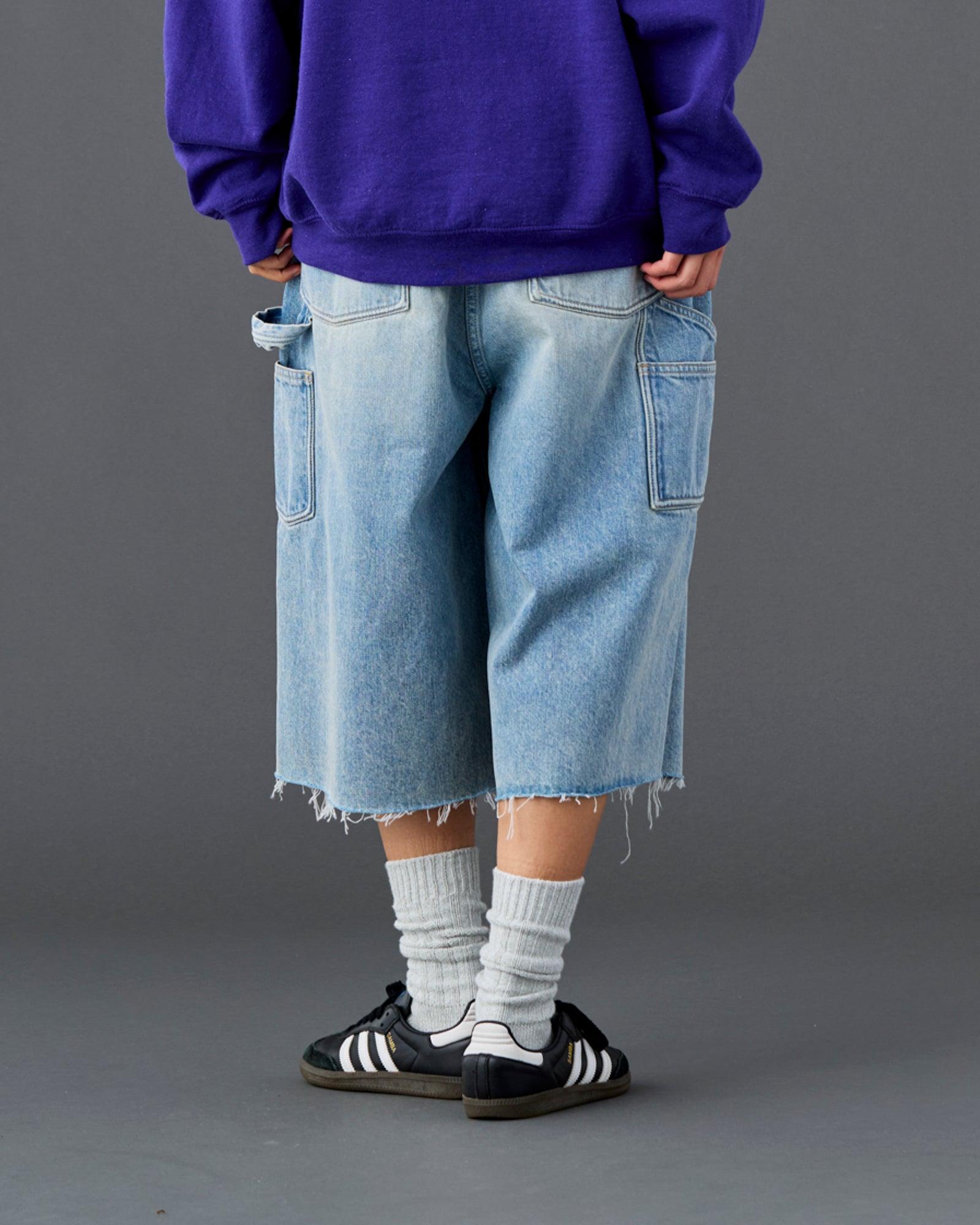 DAMAGED DENIM BUGGY SHORTS