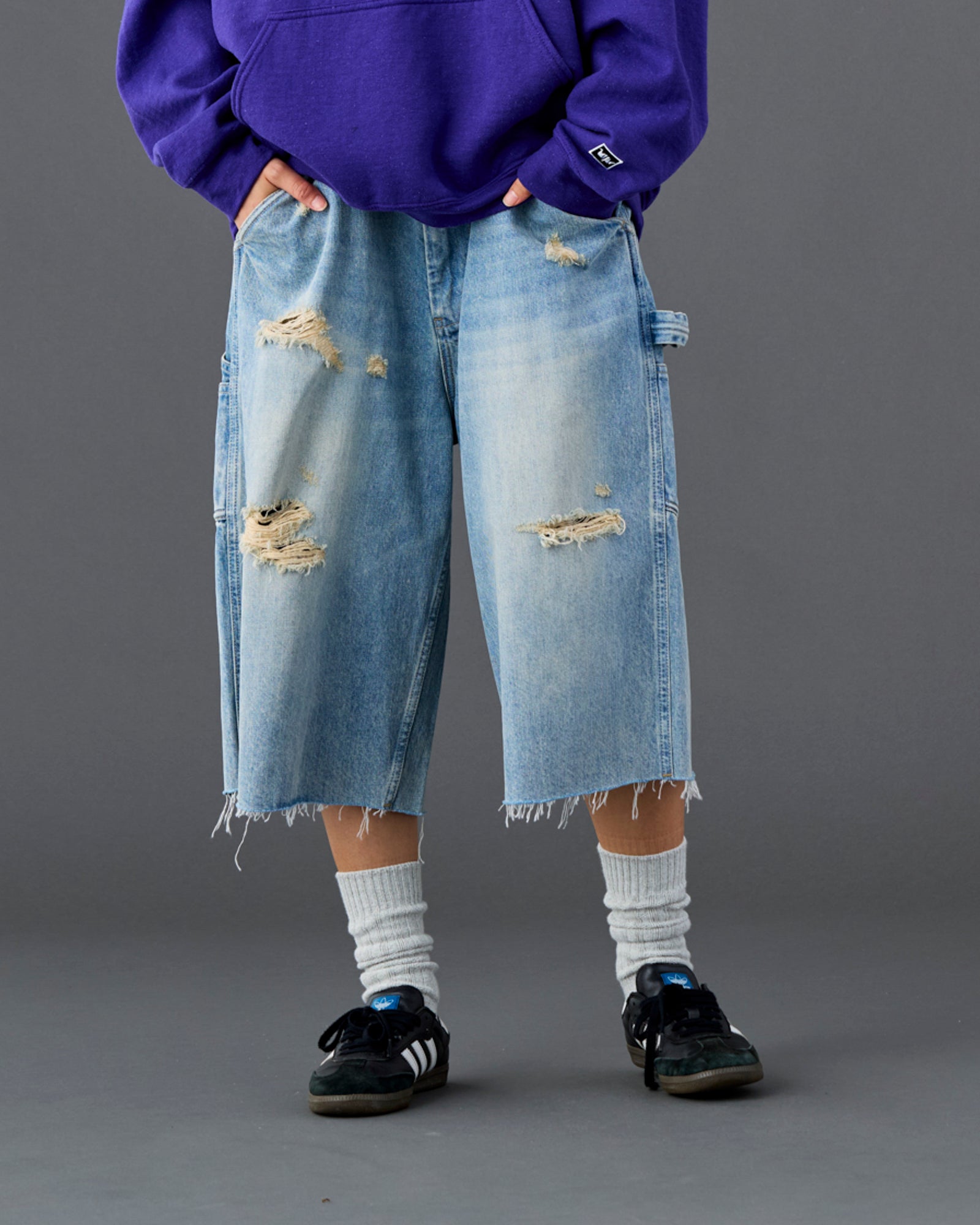DAMAGED DENIM BUGGY SHORTS