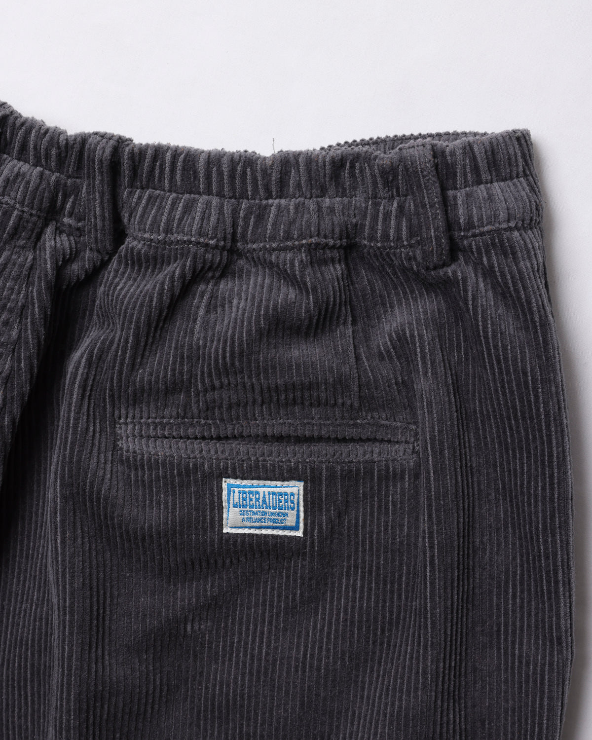 CORDUROY TAPERED SLACKS