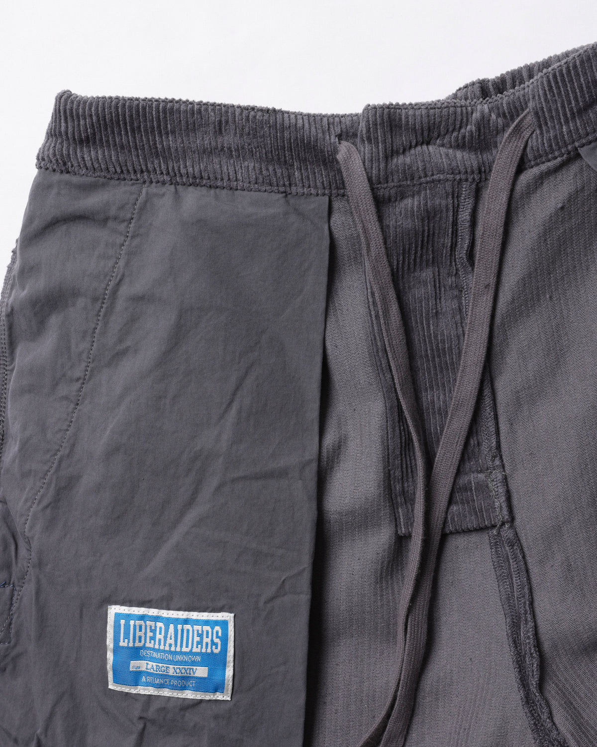CORDUROY TAPERED SLACKS