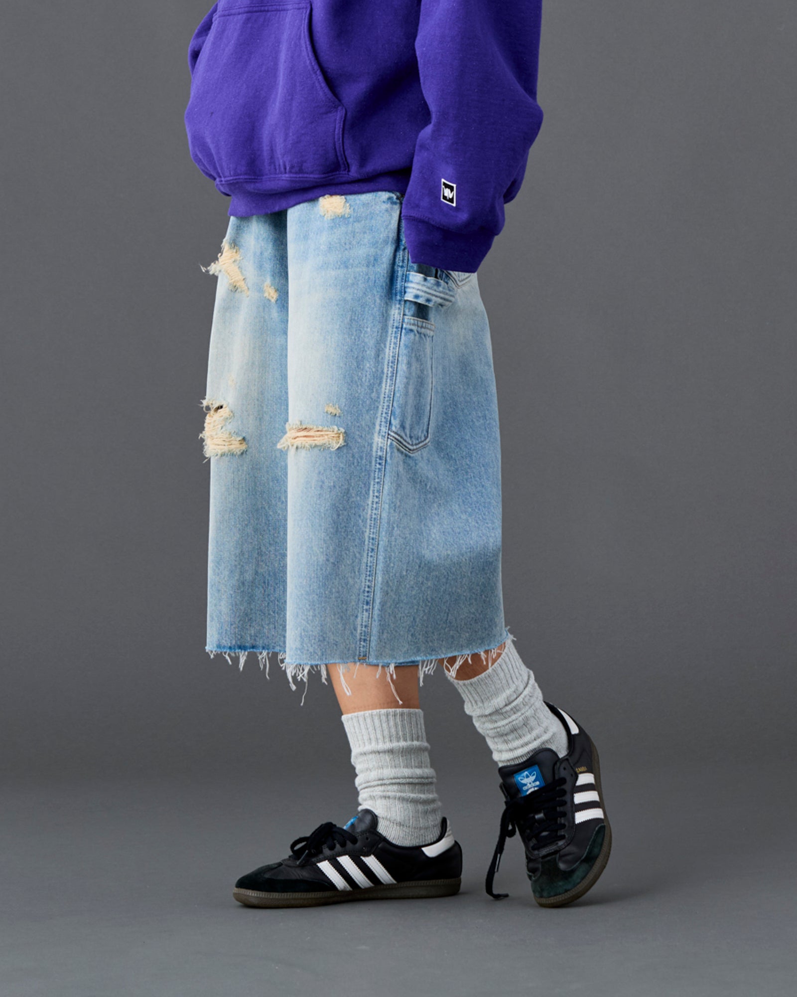 DAMAGED DENIM BUGGY SHORTS