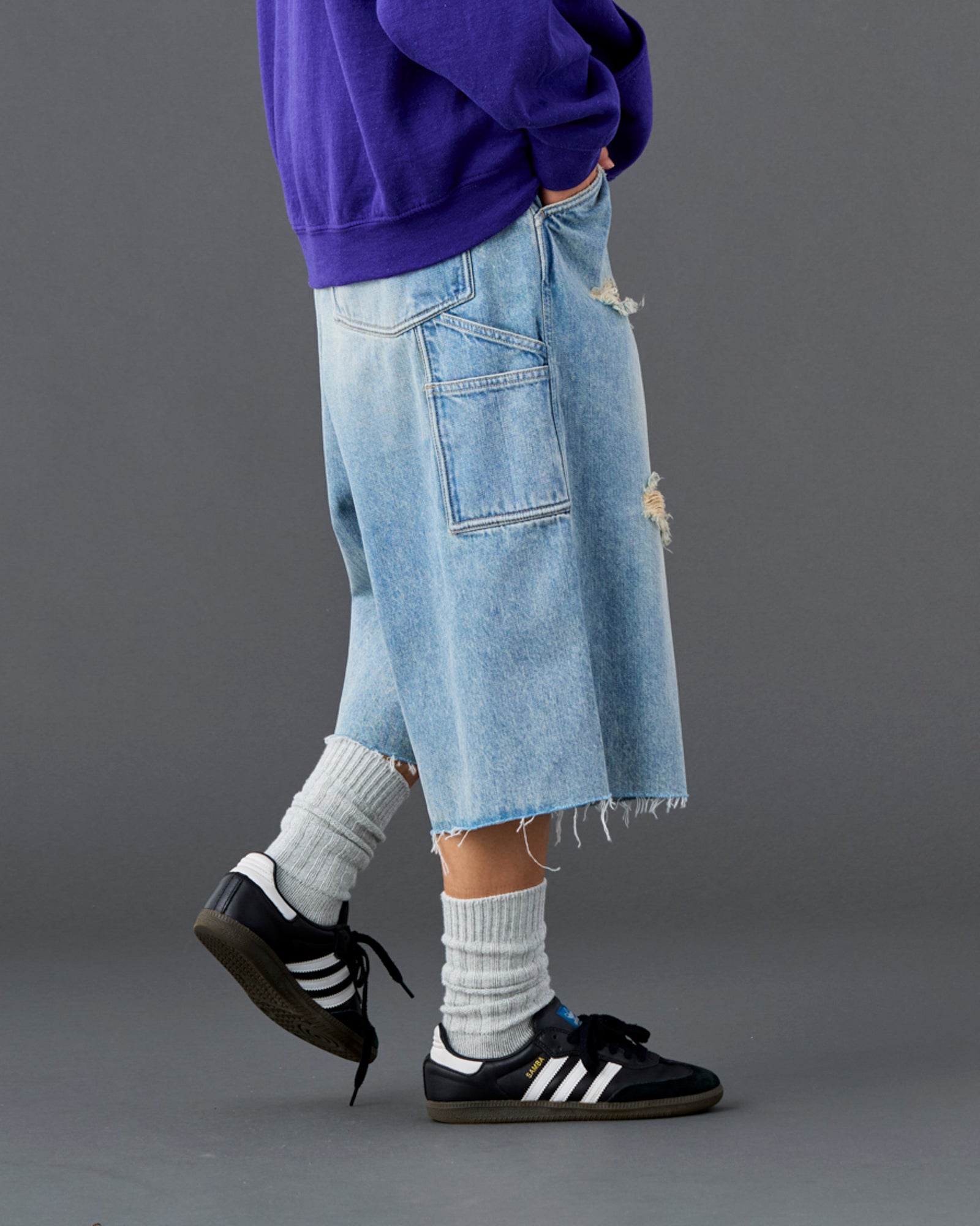 DAMAGED DENIM BUGGY SHORTS