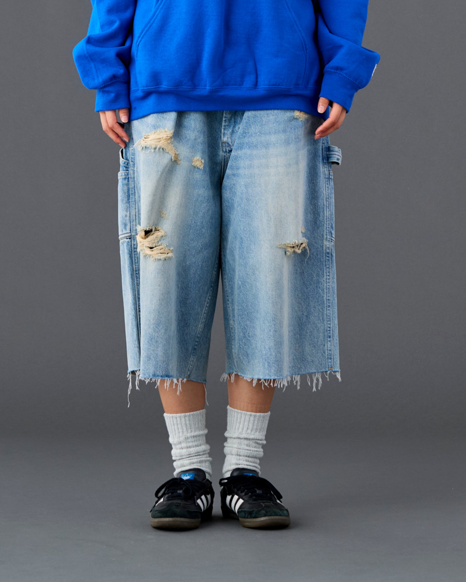 DAMAGED DENIM BUGGY SHORTS