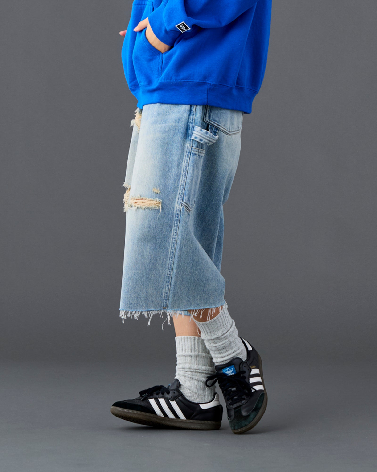 DAMAGED DENIM BUGGY SHORTS