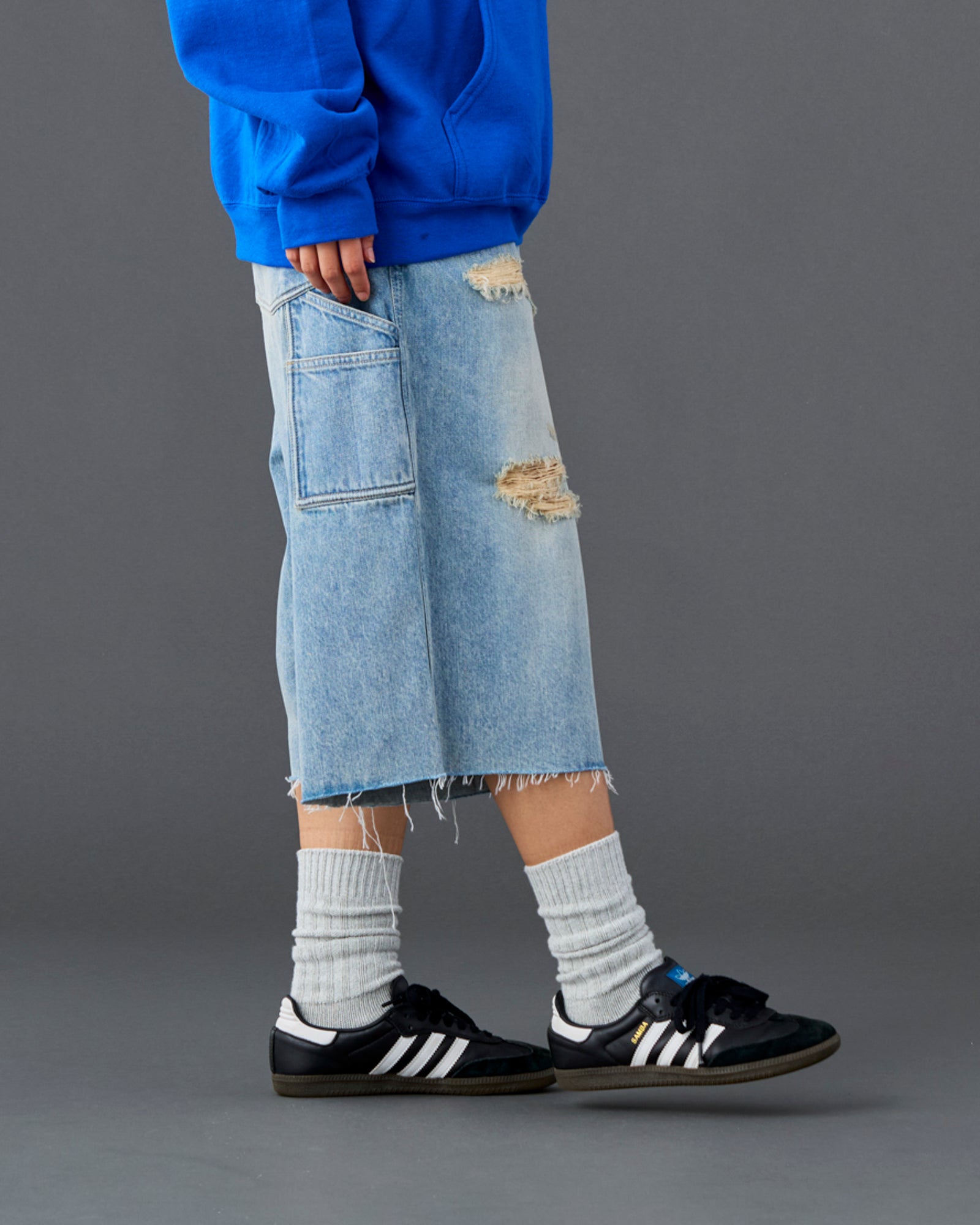 DAMAGED DENIM BUGGY SHORTS