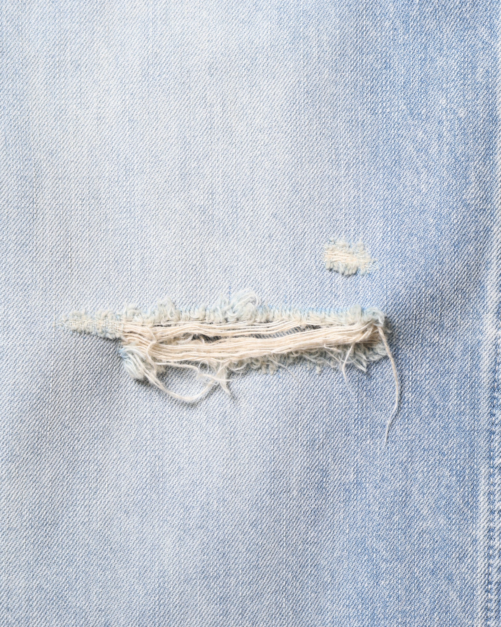 DAMAGED DENIM BUGGY SHORTS