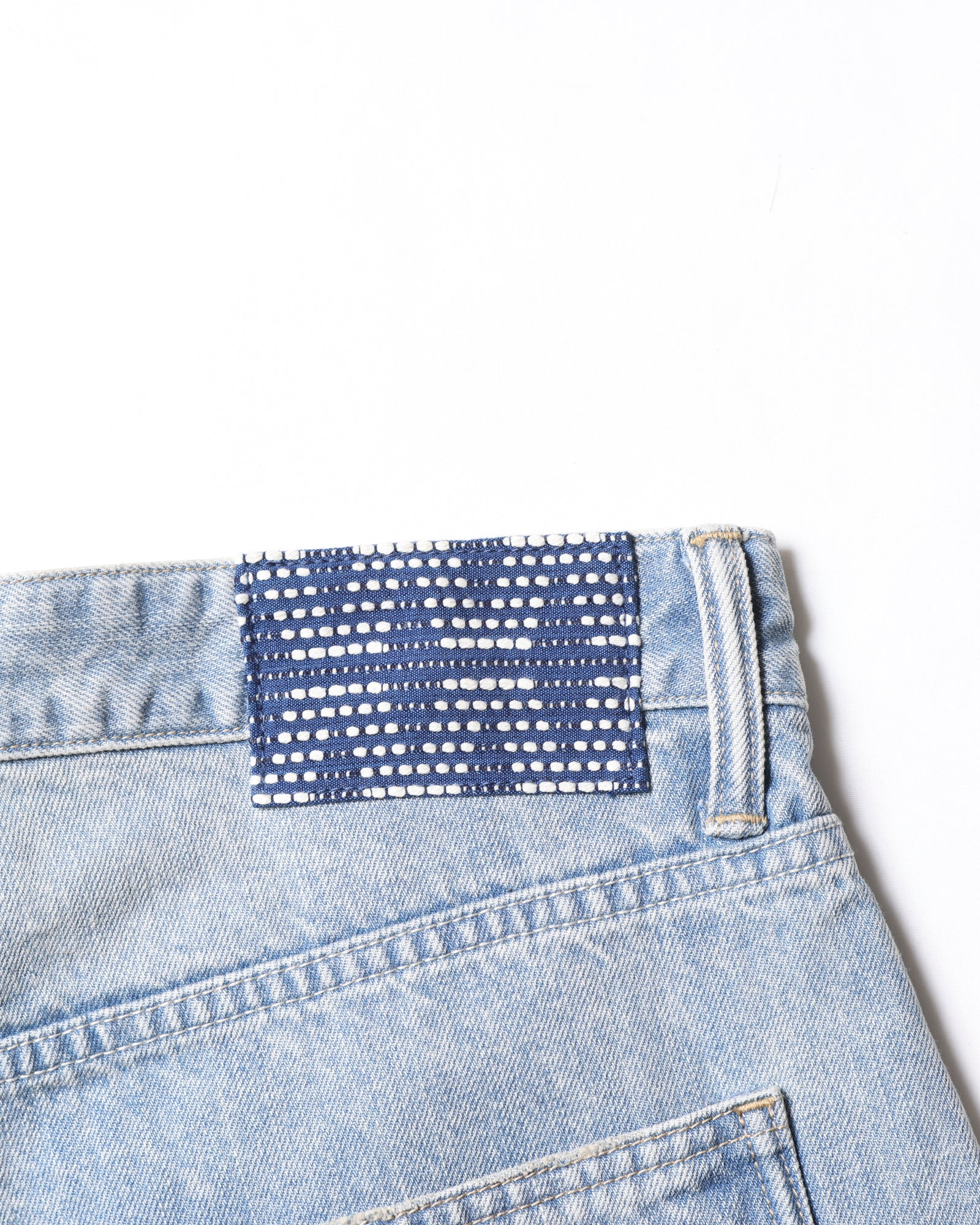DAMAGED DENIM BUGGY SHORTS